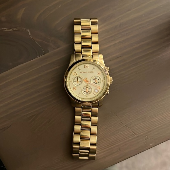 Women’s Michael Kors gold watch